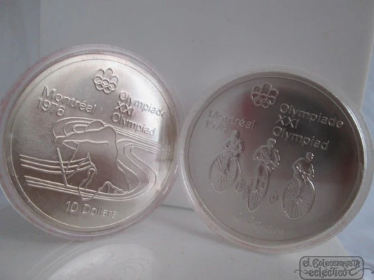 Set four sterling silver coins. Box. 1970's. Canada Olympics. Dollars