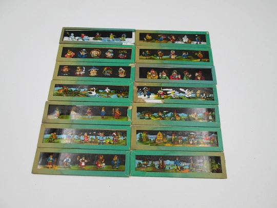 Set of 14 magic lantern slides. Original carboard box. Children's colour images. 1900's