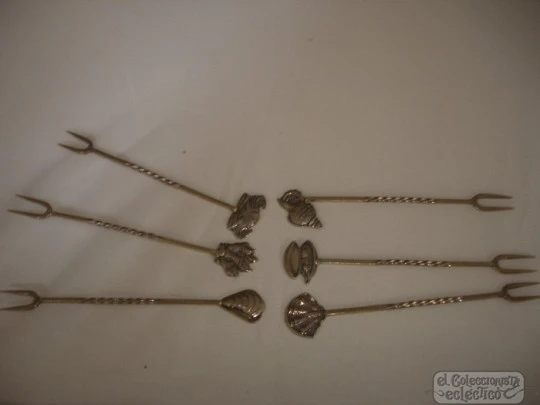 Set of six sterling silver cocktail picks. 1980's. Seafood motifs