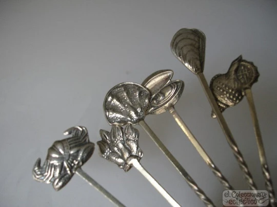 Set of six sterling silver cocktail picks. 1980's. Seafood motifs