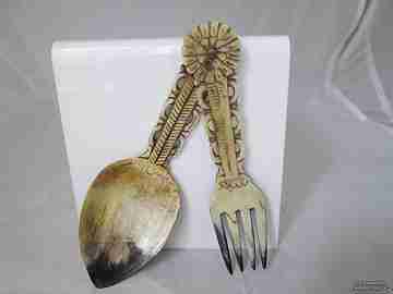 Set spoon and fork. Horn. Pastoral art. Spain. Chiseled