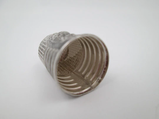 Sewing thimble. Sterling silver. High-relief owl motif. Geometric pattern. Europe. 1960's