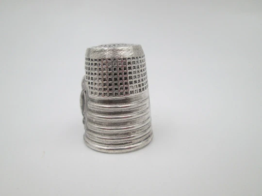 Sewing thimble. Sterling silver. High-relief owl motif. Geometric pattern. Europe. 1960's