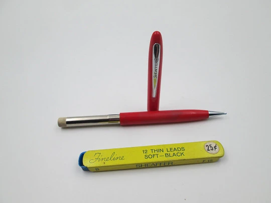 Sheaffer Fineline. Red plastic and silver plated trims. Twist system. Lead refill box. 1950's