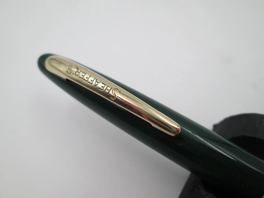 Sheaffer propelling pencil. Green plastic and gold plated. 1950's. Twist system