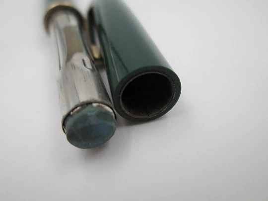 Sheaffer propelling pencil. Green plastic and gold plated. 1950's. Twist system