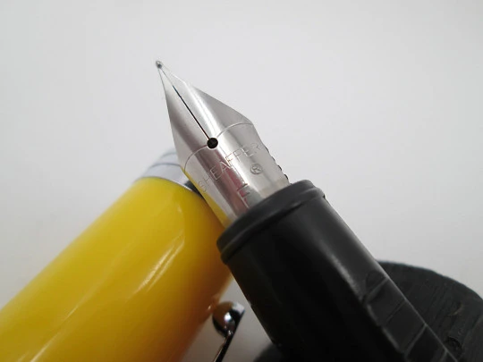 Sheaffer School fountain pen. Yellow plastic & silver plated metal. Steel nib. 1990's. USA