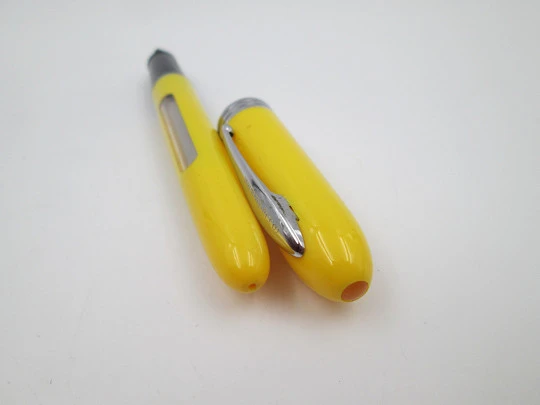 Sheaffer School fountain pen. Yellow plastic & silver plated metal. Steel nib. 1990's. USA