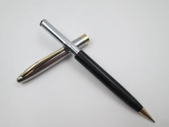 Sheaffer Sentinel mechanical pencil. Steel and black plastic. Golden trims. USA. 1940's