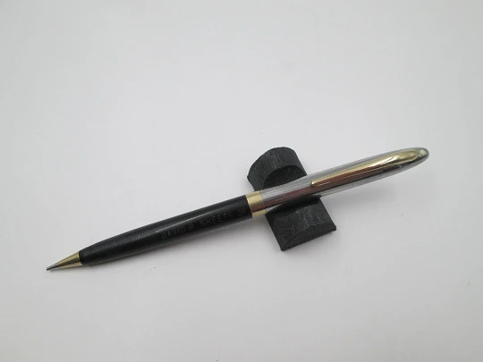 Sheaffer Sentinel mechanical pencil. Steel and black plastic. Golden trims. USA. 1940's