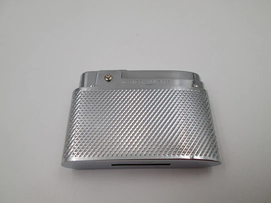 Silver Match Compound butane lighter. Silver plated metal. Linear pattern. Box. 1960's
