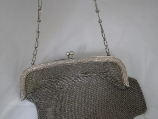 Silver mesh bag. Chain. 1920's. Ornate frame. Medallions