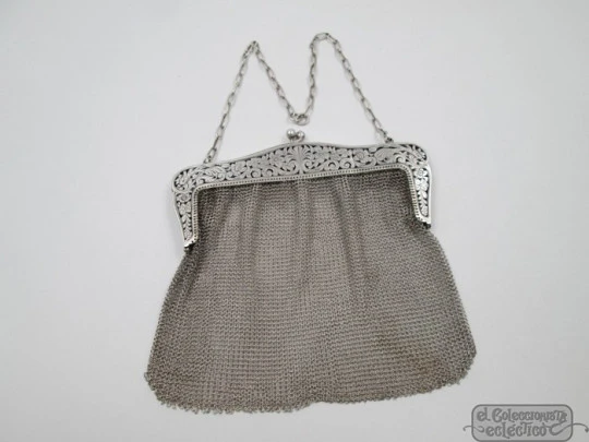 Silver mesh bag. Flowers openwork clutch frame. Chain. 1920's