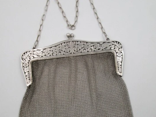 Silver mesh bag. Flowers openwork clutch frame. Chain. 1920's Silver mesh bag. Flowers openwork clutch frame. Chain. 1920's