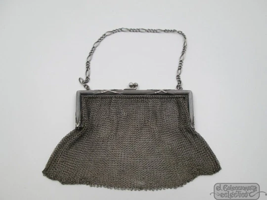 Silver mesh bag. Rectangular clutch frame. Chain. Ball clasp. 1920's