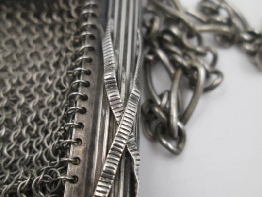 Silver mesh bag. Rectangular clutch frame. Chain. Ball clasp. 1920's