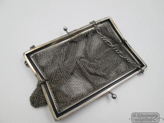 Silver mesh bag. Rectangular clutch frame. Chain. Ball clasp. 1920's