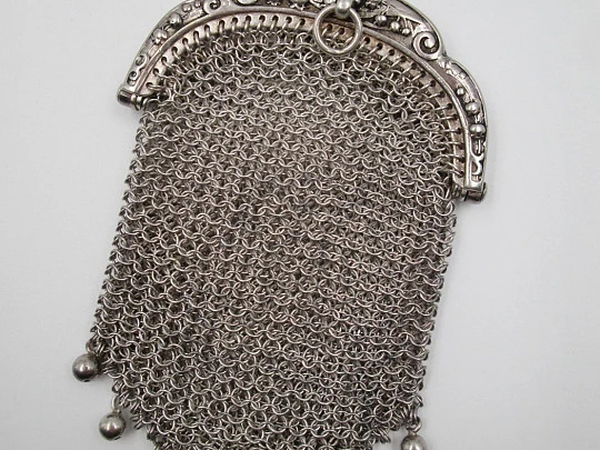 Silver mesh purse. Scrolls and vegetable motifs. France. 1930's