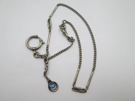 Silver plated metal pocket watch chain. Ovals and rectangles. Pendant with blue gem