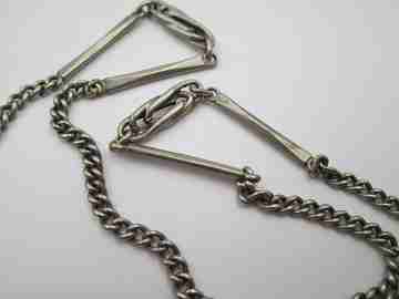 Silver plated metal pocket watch chain. Ovals and rectangles. Pendant with blue gem