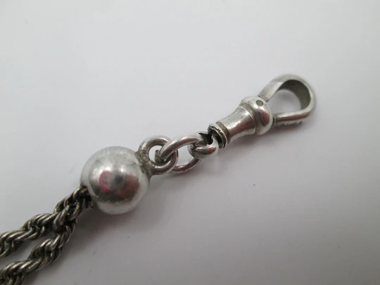 Silver pocket watch chain. Ball, spheres and octagons. Lobster clasp. Europe. 1910's