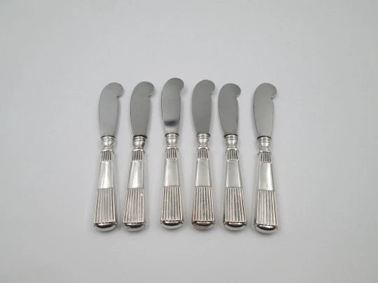 Six butter knives collection. Sterling silver. Ribbed design handles. Europe. 1950's
