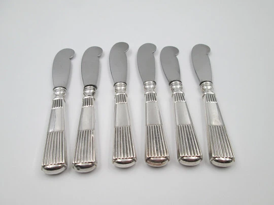 Six butter knives collection. Sterling silver. Ribbed design handles. Europe. 1950's