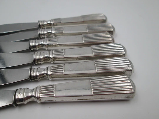 Six butter knives collection. Sterling silver. Ribbed design handles. Europe. 1950's