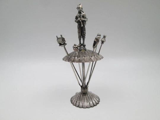 Six cocktail skewers collection with bagpiper figure stand. Silver plated metal. Spain. 1980's