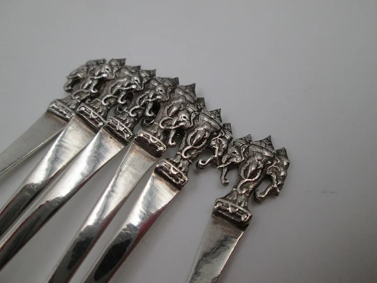 Six ornate coffee spoon set. 925 sterling silver. Shield with elephant motifs on top. 1990's