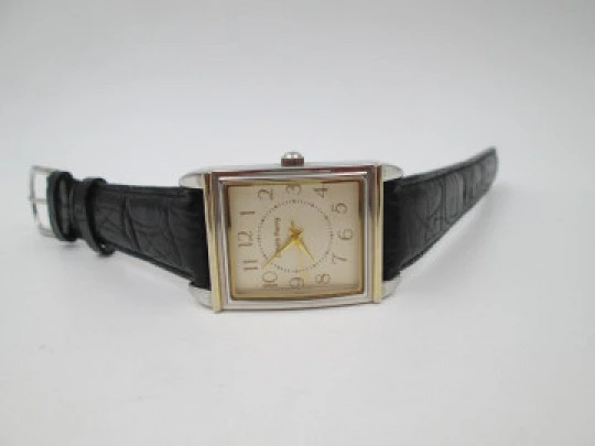 Smith Ferry. Chromed and golden metal. Steel press back. Quartz, Strap. 1980's. Japan