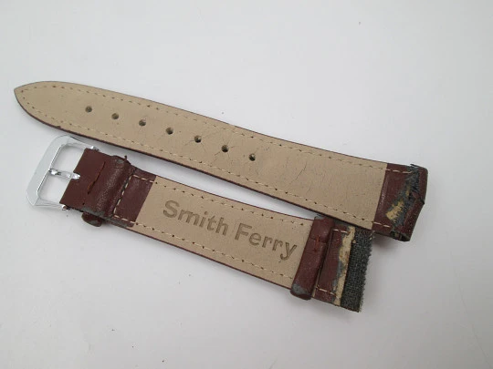 Smith Ferry. Chromed and golden metal. Steel press back. Quartz, Strap. 1980's. Japan