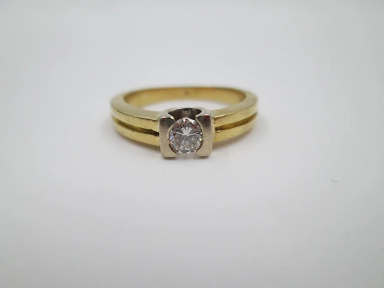 Solitario mujer. Oro amarillo 18 quilates. Diamante brillante 0,25 ct.