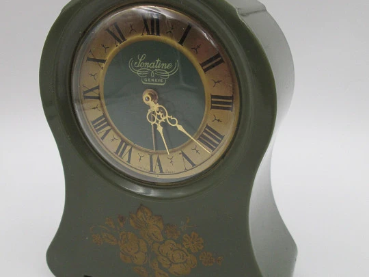 Sonatine musical table clock. Wind-up mechanism. Green bakelite & golden metal