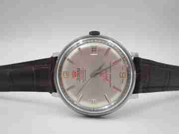 Sorna De Luxe. Stainless steel & chromed metal. Manual wind. Calendar. 1960's. Swiss