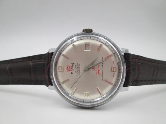 Sorna De Luxe. Stainless steel & chromed metal. Manual wind. Calendar. 1960's. Swiss