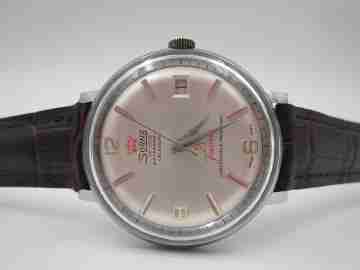 Sorna De Luxe. Stainless steel & chromed metal. Manual wind. Calendar. 1960's. Swiss
