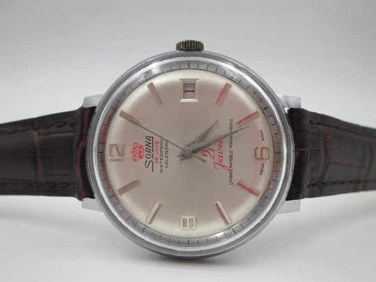 Sorna De Luxe. Stainless steel & chromed metal. Manual wind. Calendar. 1960's. Swiss