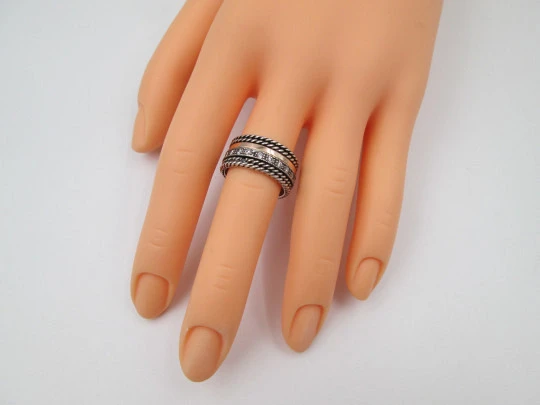 Sortija giratoria para mujer. Plata de ley, oro amarillo y gemas blancas. 2000. Portugal