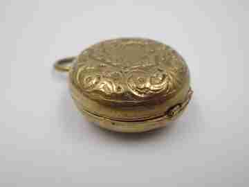 Sovereign case. Gold plated metal. Vegetable motifs. Woman bust. 1940's