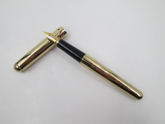 Spirit of St. Louis fountain pen. Gold plated and black resin. Converter. USA. 1990's