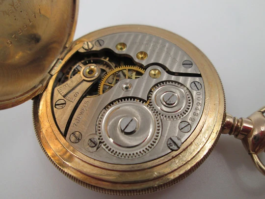 Standard hunter-case pocket watch. Gold plated. Stem-wind. Porcelain dial. 1910's