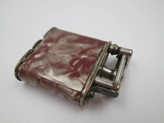 Steco pocket petrol lighter. Hammer type. Silver plated metal & marble celluloid. 1940's