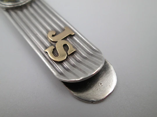 Sterling silver and gold money clip. Ribbed motifs and Alfa Romeo logo. Europe. 1980's