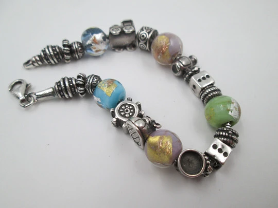 Sterling silver bracelet. Charms and colours crystal balls. Italy. 2010