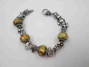 Sterling silver bracelet. Charms and painted crystal balls. Italy. 2010