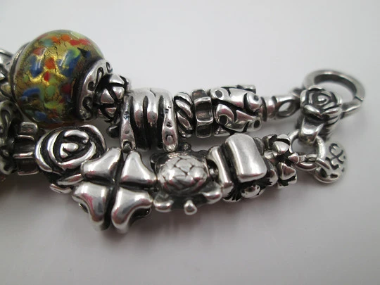 Sterling silver bracelet. Charms and painted crystal balls. Italy. 2010