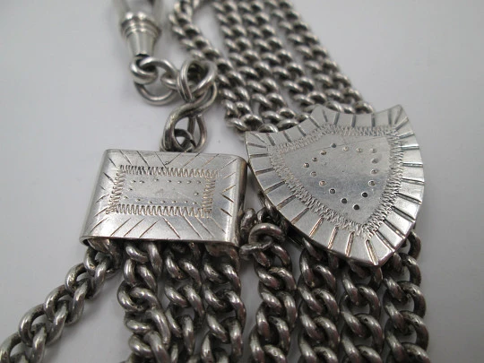 Sterling silver chatelaine. Four chains. Sliding shield. Cow charm. 1910's