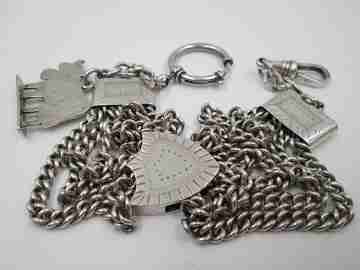 Sterling silver chatelaine. Four chains. Sliding shield. Cow charm. 1910's