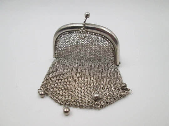 Sterling silver double mesh purse. Half moon clutch frame. Balls clasp. 1930's. Europe